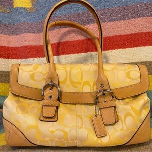 Coach bag- beautiful yellow and tan leather detailing.